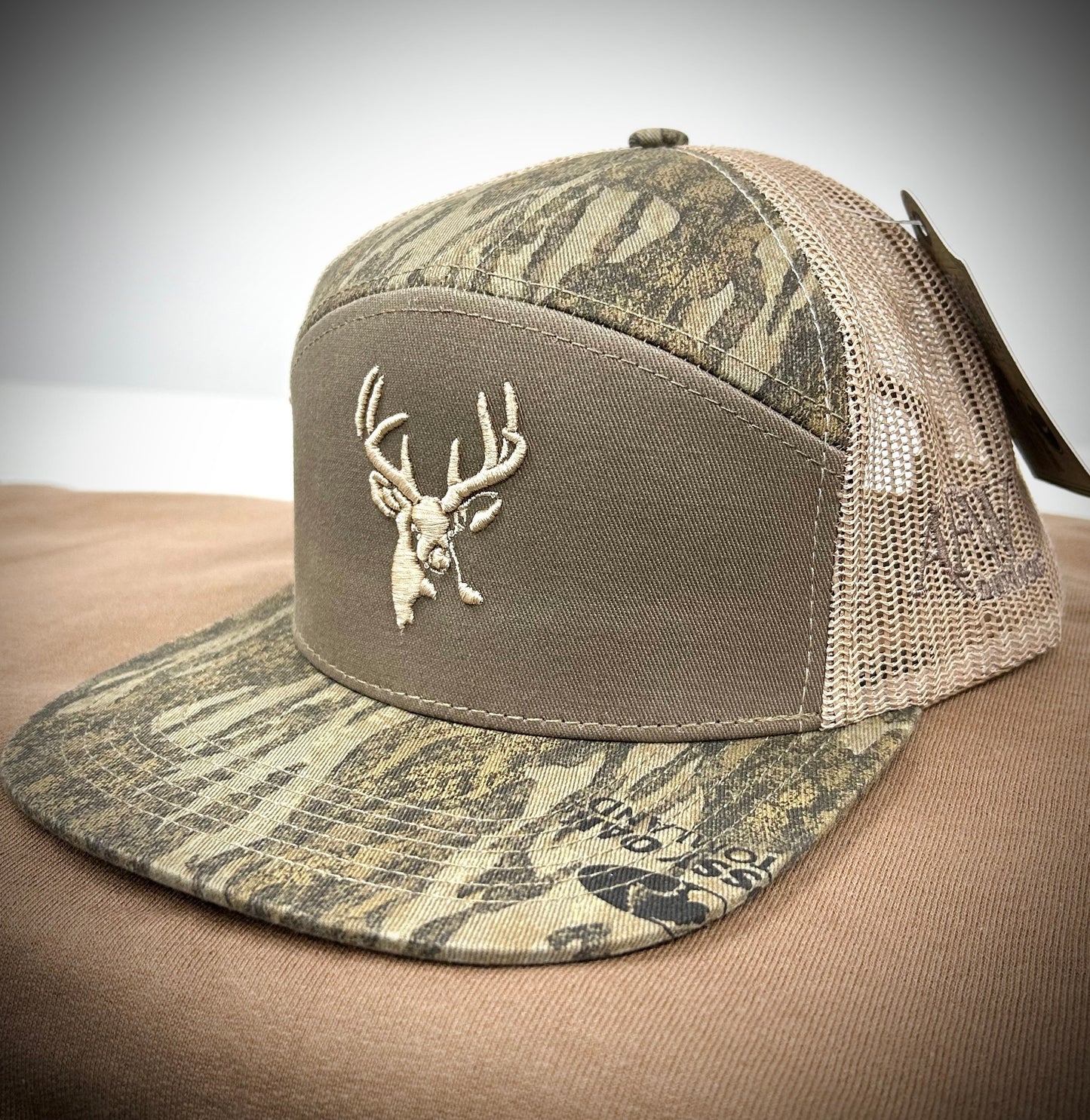 Mossy Oak New Bottomland & Sage Buck Logo