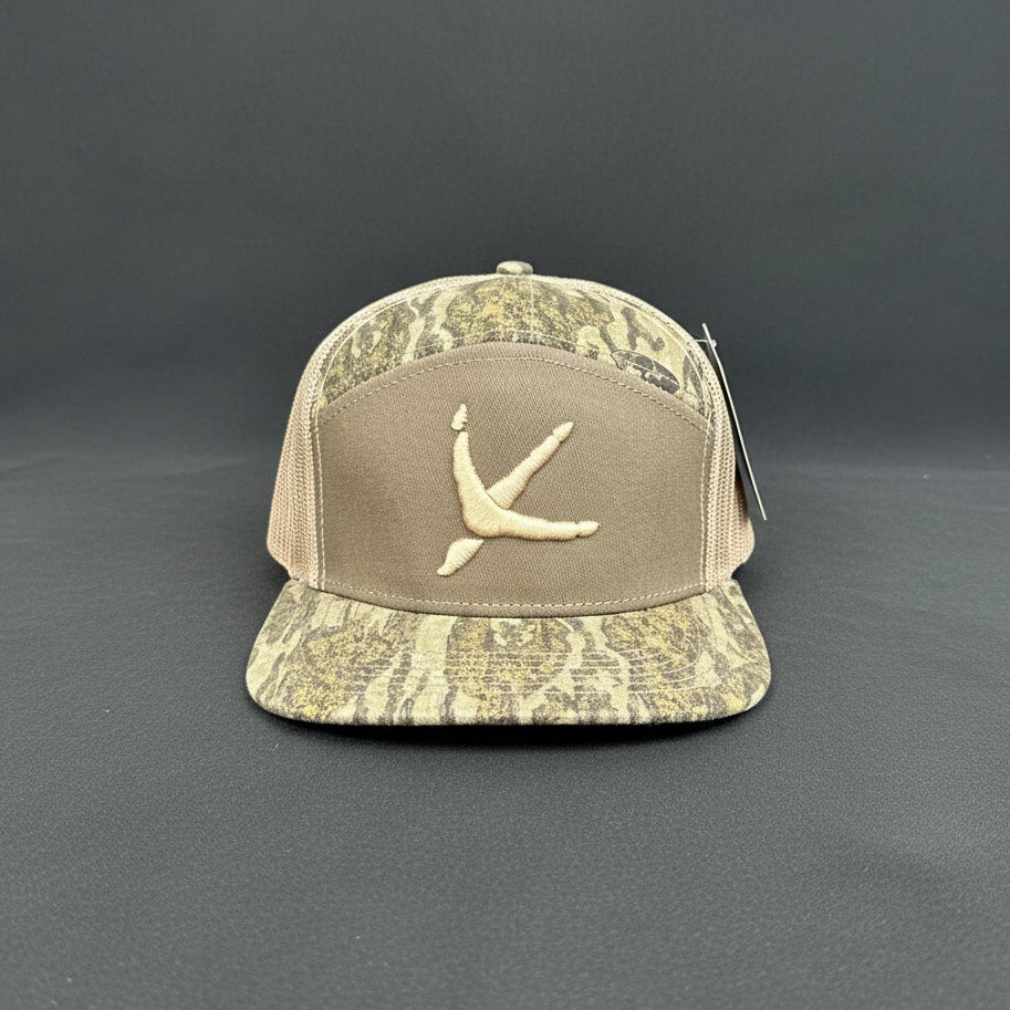 Mossy Oak New Bottomland & Sage Turkey Tracks Logo