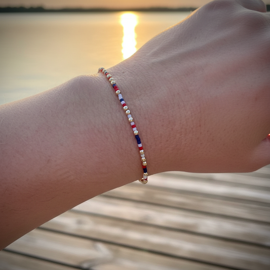 Miss Americana patriotic bracelet lifestyle shot on dock